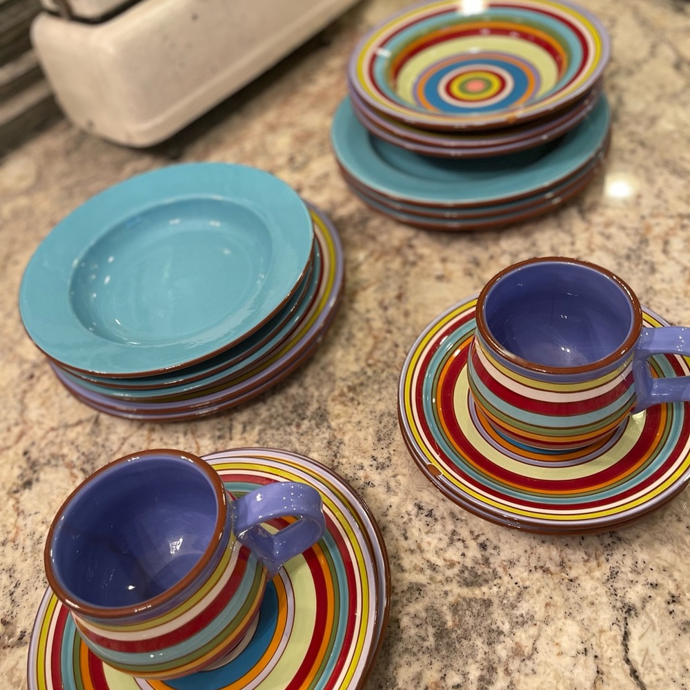 Unique eclectic pottery dinnerware set.